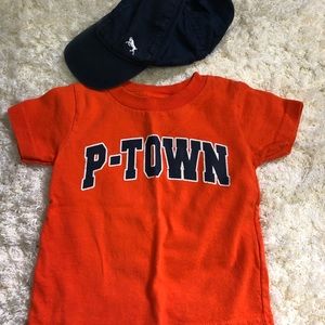 P-Town shirt and dark blue hat
